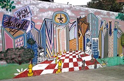 Detalhe: Mural em local público promovendo virtudes humanas, crianças jogam xadrez,